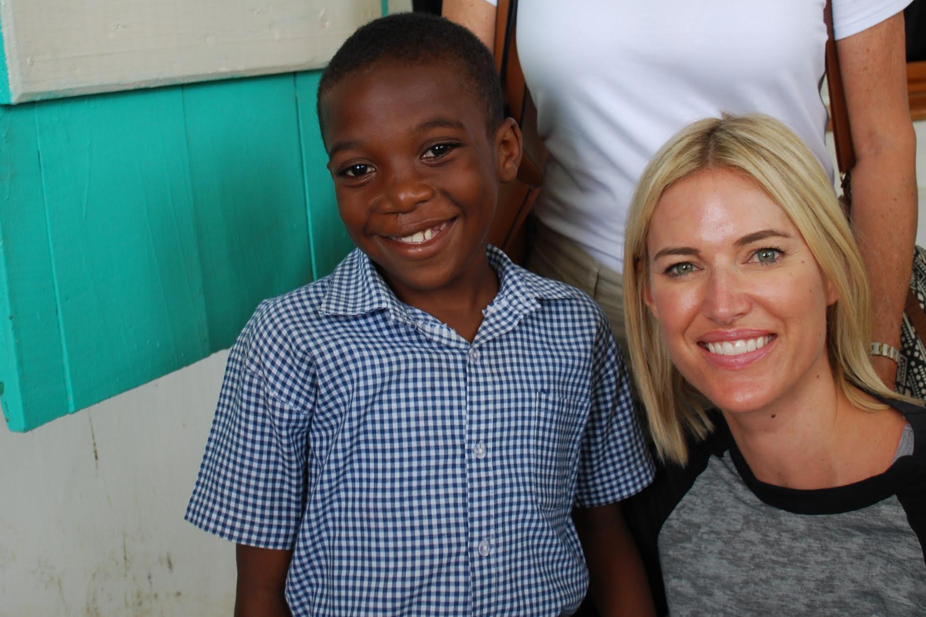 Kristen Taekman shares a smile with a Smile Train patient at Justinian University Hospital in Cap-Haitien, Haiti.