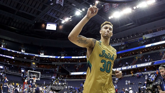 Mar 10, 2016; Washington, DC, USA; Notre Dame Fighting Irish forward Zach Auguste (30) salutes fans in the stands while leaving the court after the Fighting Irish' game against the Duke Blue Devils during day three of the ACC conference tournament at Verizon Center. The Fighting Irish won 84-79 in overtime. Mandatory Credit: Geoff Burke-USA TODAY Sports