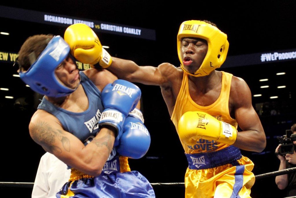 Richardson Hitchins (r.) slugs his opponent during a boxing match at the Barclays Center in Brooklyn in April. (KEN GOLDFIELD FOR NEW YORK DAILY NEWS)