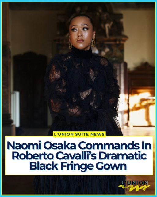 @NaomiOsaka just reminded everyone why she’s one of fashion’s most compelling athletes. The tennis star posted a series of striking portraits wearing Roberto Cavalli Fall Winter 2026/27 Look 44, a towering, all-black high-neck gown covered in cascading fringe that moves like feathers.
The look is peak “Nero Carnale,” the name Fausto Puglisi gave the collection he sent down the Milan runway in February. After seasons of color and animal print, Puglisi went almost entirely black: textured, sensual, and unapologetically dramatic. Leather, crocodile jacquard, lace, mohair, and faux astrakhan created depth. Color arrived only as sharp flashes of periwinkle, cyclamen, and electric pink.
Look 44 is one of the collection’s most theatrical pieces. A fitted high-neck bodice in sheer black lace and ruffles meets a voluminous skirt of layered fringe that trails behind the wearer. The silhouette is both structured and fluid, control meeting instinct, exactly what Puglisi said he wanted. Gold drop earrings and strappy sandals complete the look in the palazzo-style photos Osaka shared.
The images feel cinematic: Osaka standing in grand rooms with frescoes, gilded mirrors, and parquet floors, the gown pooling and sweeping as she turns. It’s the kind of moment that bridges sport and couture without trying too hard. Osaka has spent the last two years turning walk-ons and red carpets into fashion events. This one lands as a statement rather than a costume.
Puglisi has described the season as “a sensual black, infused with hyper-femininity and a quiet, underlying optimism.” Look 44 delivers that idea in one garment. It is dark, but it is not grim. It is opulent without being loud. It is Cavalli through a new, more concentrated lens.
📸 @seebasschin @officialsheiks @aminatacreative
#lunionsuite #haitianamerican #haitian 